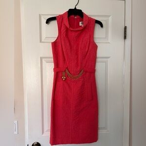 Beautiful pink dress w gold accent and two functional pockets. Fully lined. EUC